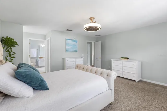 a very nice looking living room with furniture and a large window