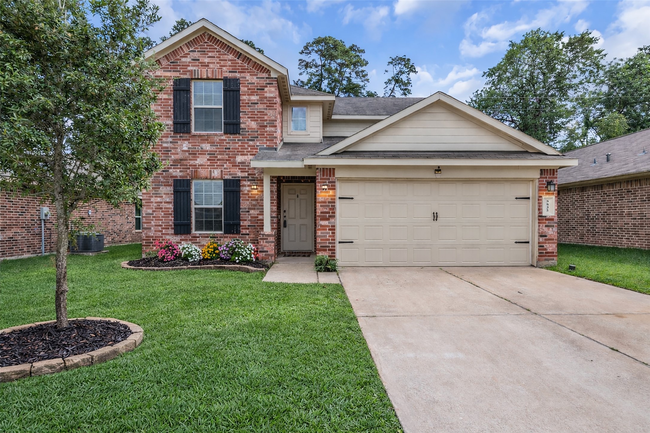 5635 Rainflower Terrace Lane Spring, TX 77389 - Photo 8 of 46 Stunning home- generator, high ceilings & spacious rooms. NO back neighbors!
- Flowers have been added to this enhanced photo w grass color.