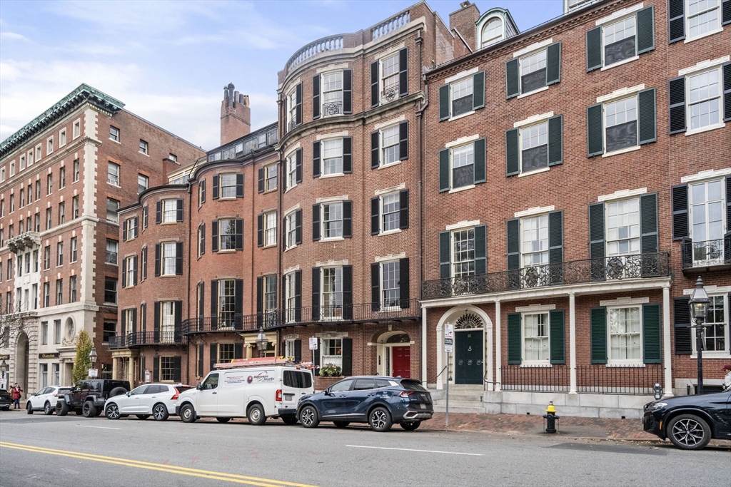62 Beacon Street, Unit 3 Boston, MA 02108 - Photo 24 of 25 a car parked in front of a building