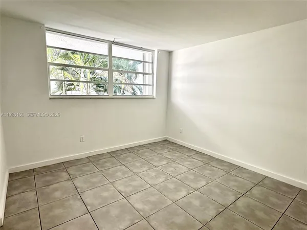 an empty room with a window