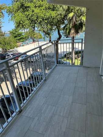 a view of balcony with furniture