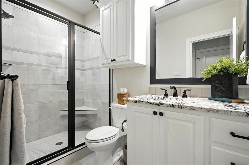136 Dove Run Tuscola, TX 79562 - Photo 25 of 37 Bathroom featuring vanity and a shower stall
