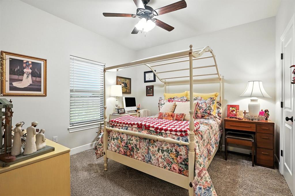 136 Dove Run Tuscola, TX 79562 - Photo 26 of 37 Bedroom featuring carpet flooring and a ceiling fan