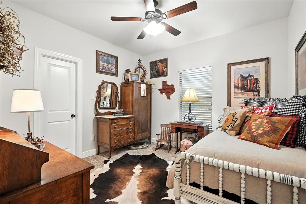 136 Dove Run Tuscola, TX 79562 - Photo 31 of 37 Carpeted bedroom with baseboards and ceiling fan