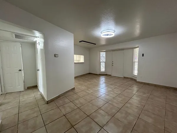 an empty room with a natural light