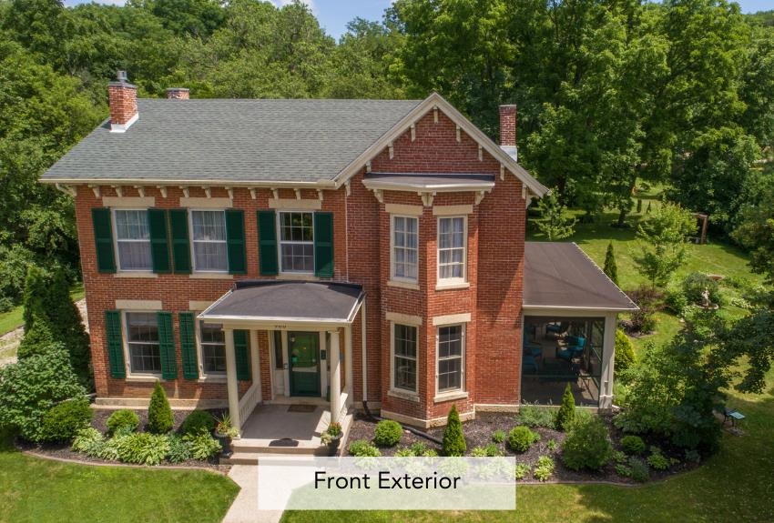 900 3rd Street Galena, IL 61036 - Photo 1 of 1 a front view of a house with garden