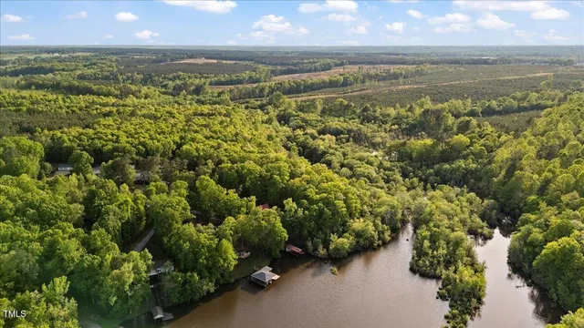 a view of a lake with a yard
