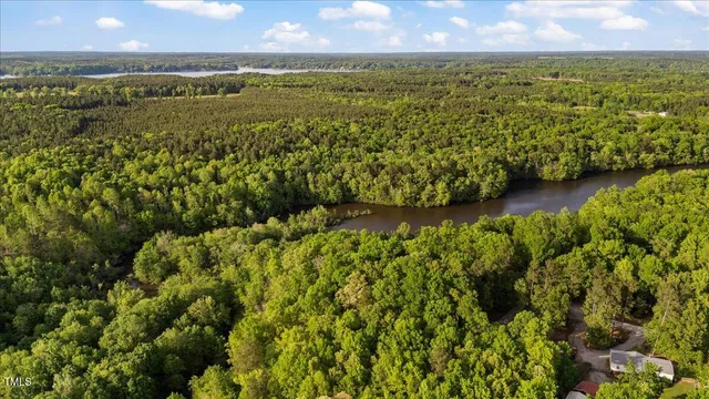 a view of an ocean and a yard