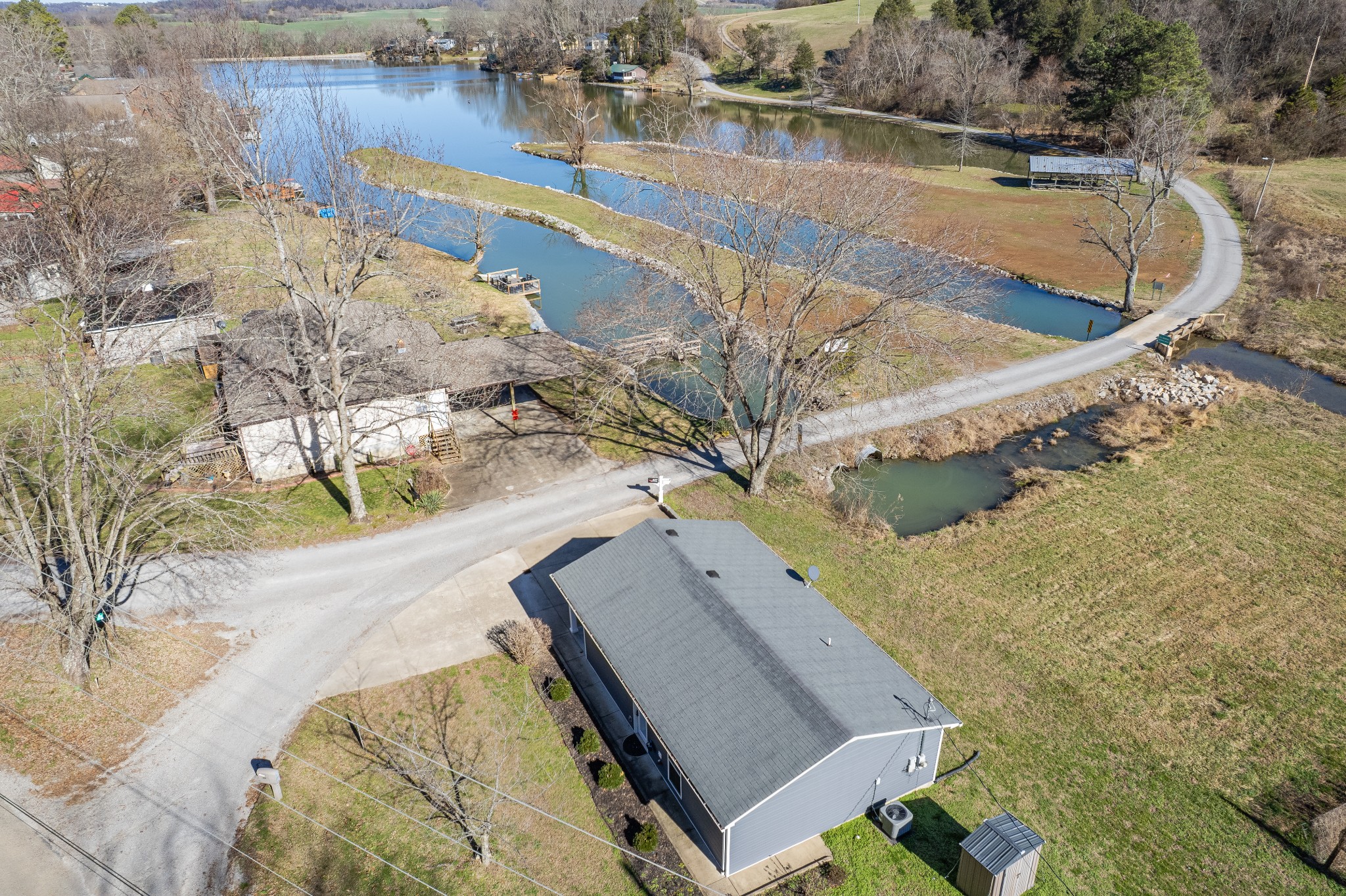 807 Clear Creek Road Pulaski, TN 38478 - Photo 1 of 68 a view of a swimming pool with a yard