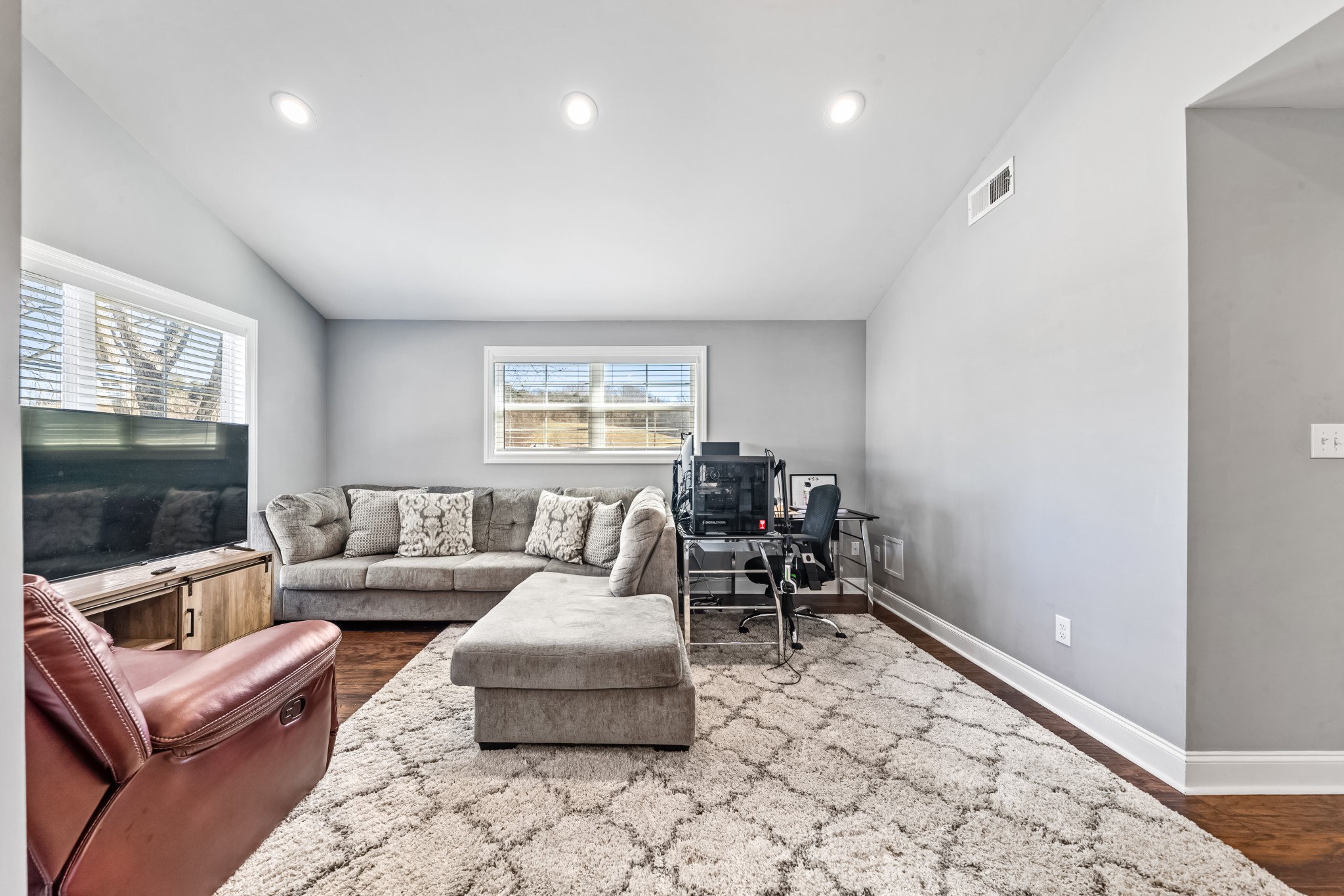 807 Clear Creek Road Pulaski, TN 38478 - Photo 11 of 68 a living room with furniture and a flat screen tv