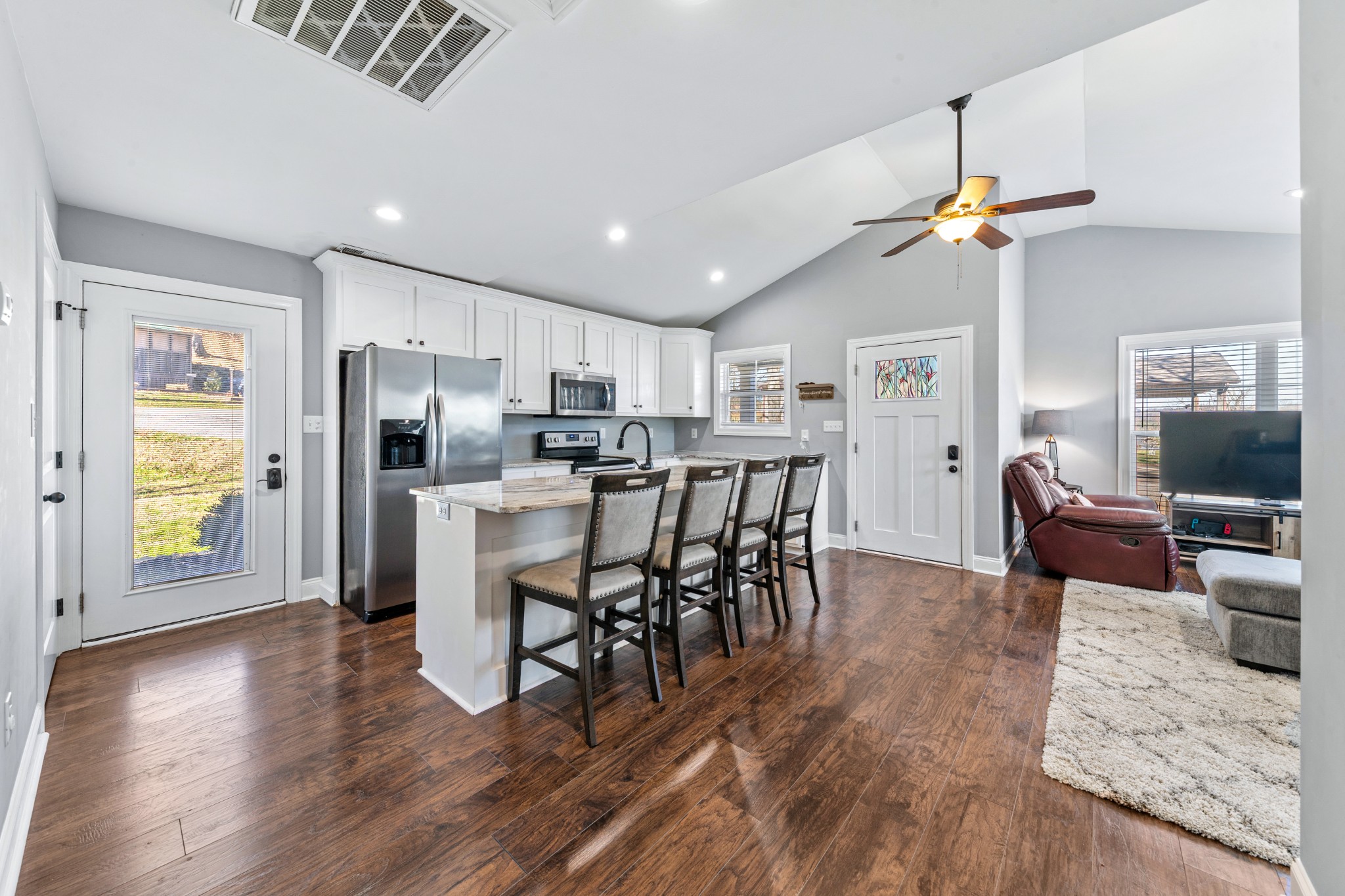 807 Clear Creek Road Pulaski, TN 38478 - Photo 16 of 68 a view of a dining room with furniture window and wooden floor