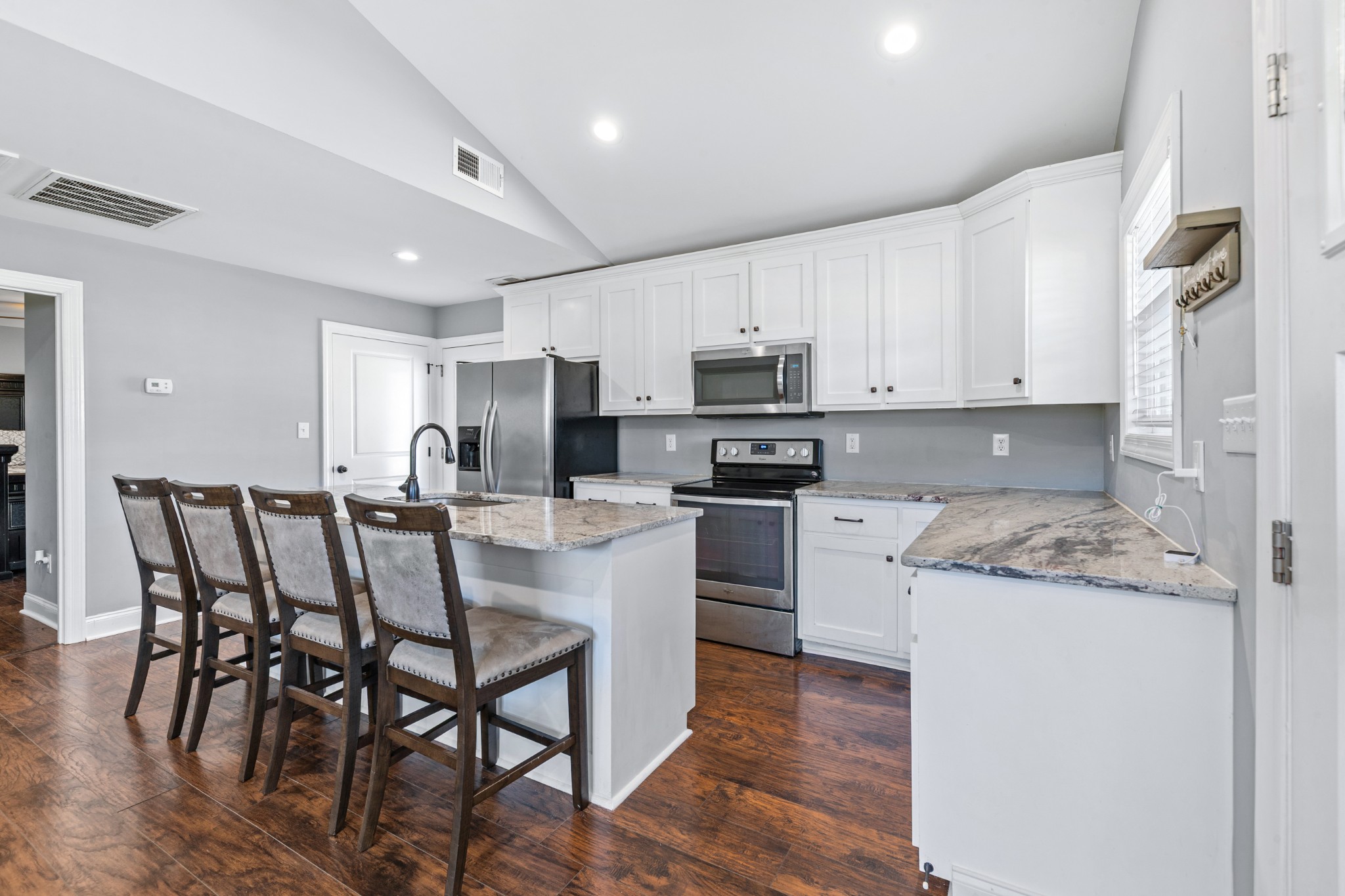 807 Clear Creek Road Pulaski, TN 38478 - Photo 19 of 68 a kitchen with appliances a sink and cabinets