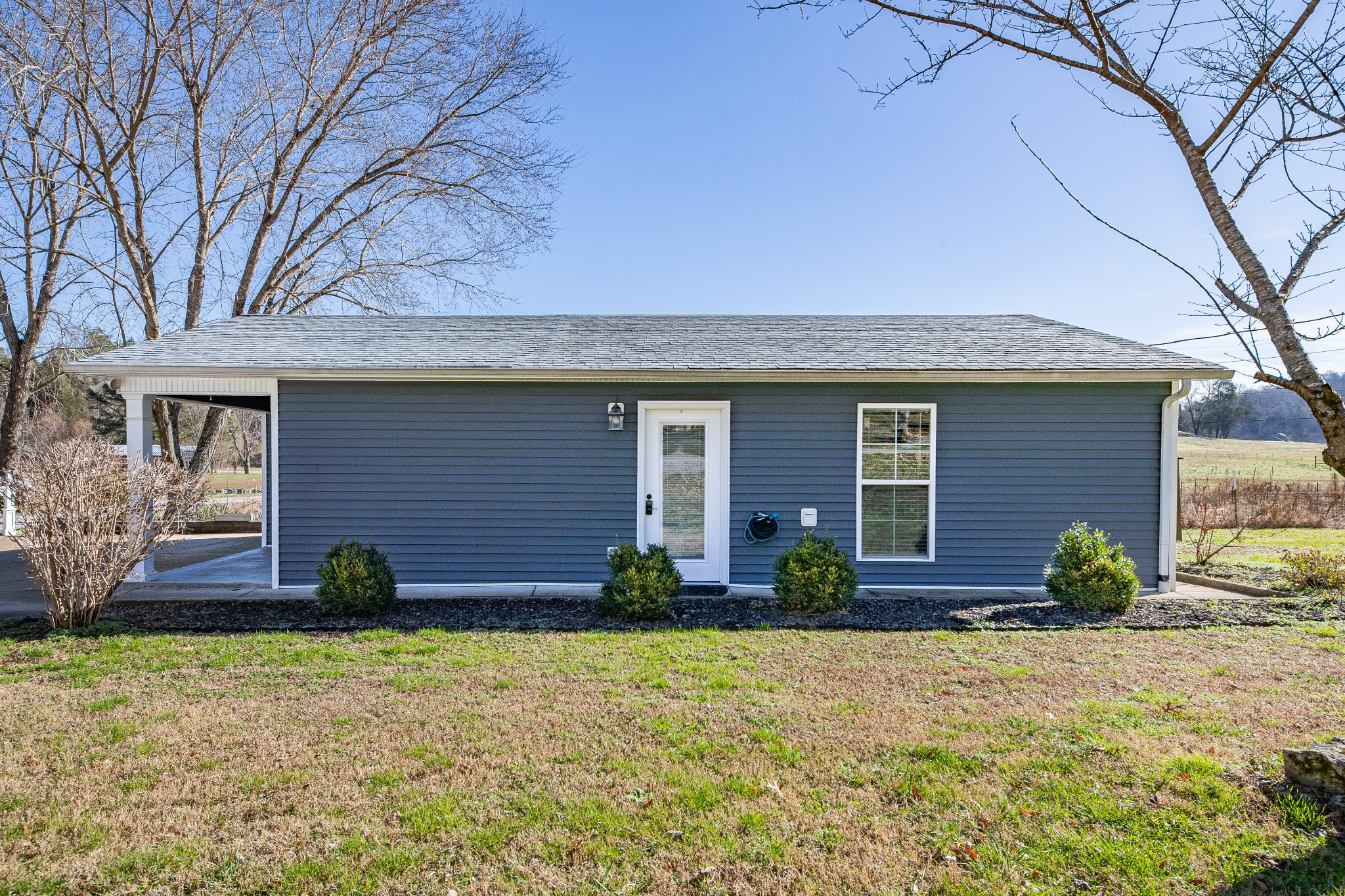807 Clear Creek Road Pulaski, TN 38478 - Photo 36 of 68 a front view of a house with garden