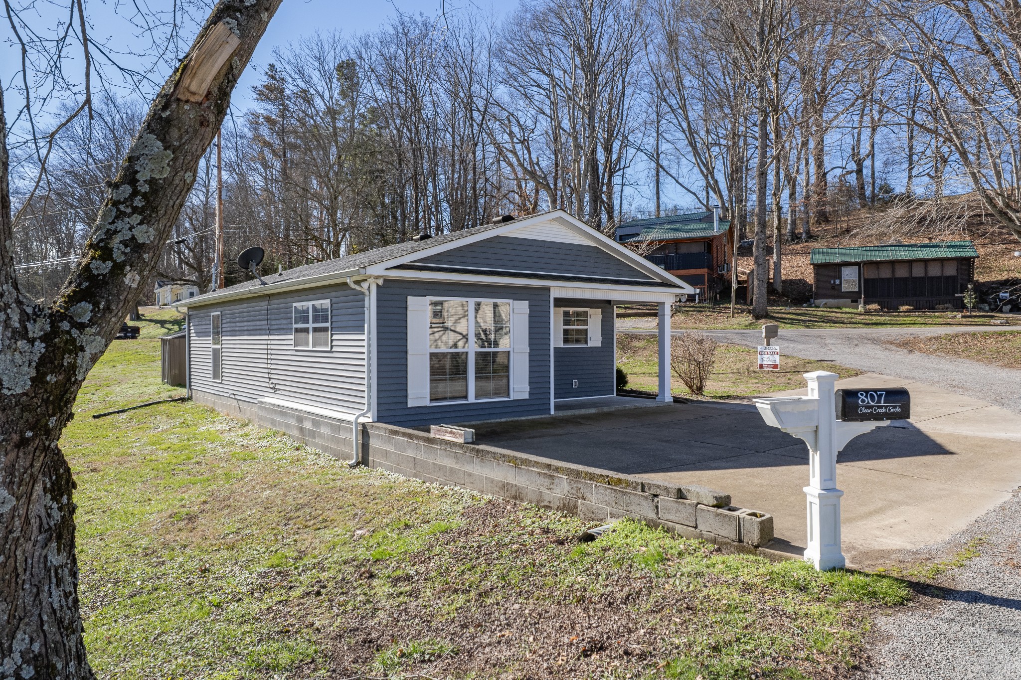 807 Clear Creek Road Pulaski, TN 38478 - Photo 37 of 68 a front view of a house with garden