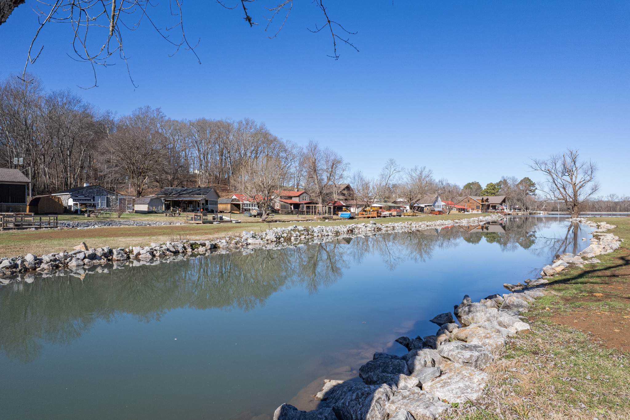 807 Clear Creek Road Pulaski, TN 38478 - Photo 39 of 68 a view of a lake with houses