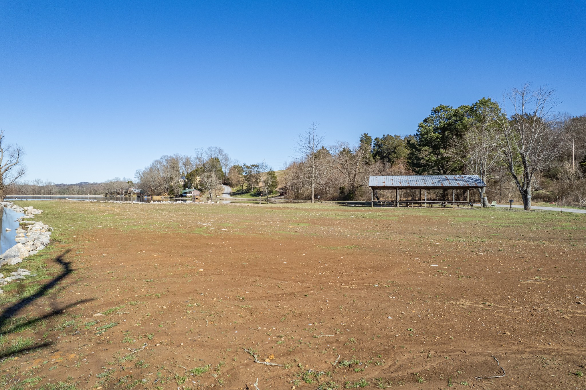807 Clear Creek Road Pulaski, TN 38478 - Photo 41 of 68 a view of a lake with houses in the back