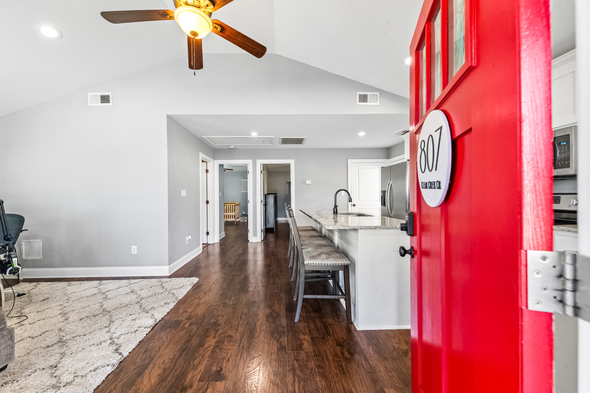 807 Clear Creek Road Pulaski, TN 38478 - Photo 9 of 68 a view of a room with wooden floor and staircase