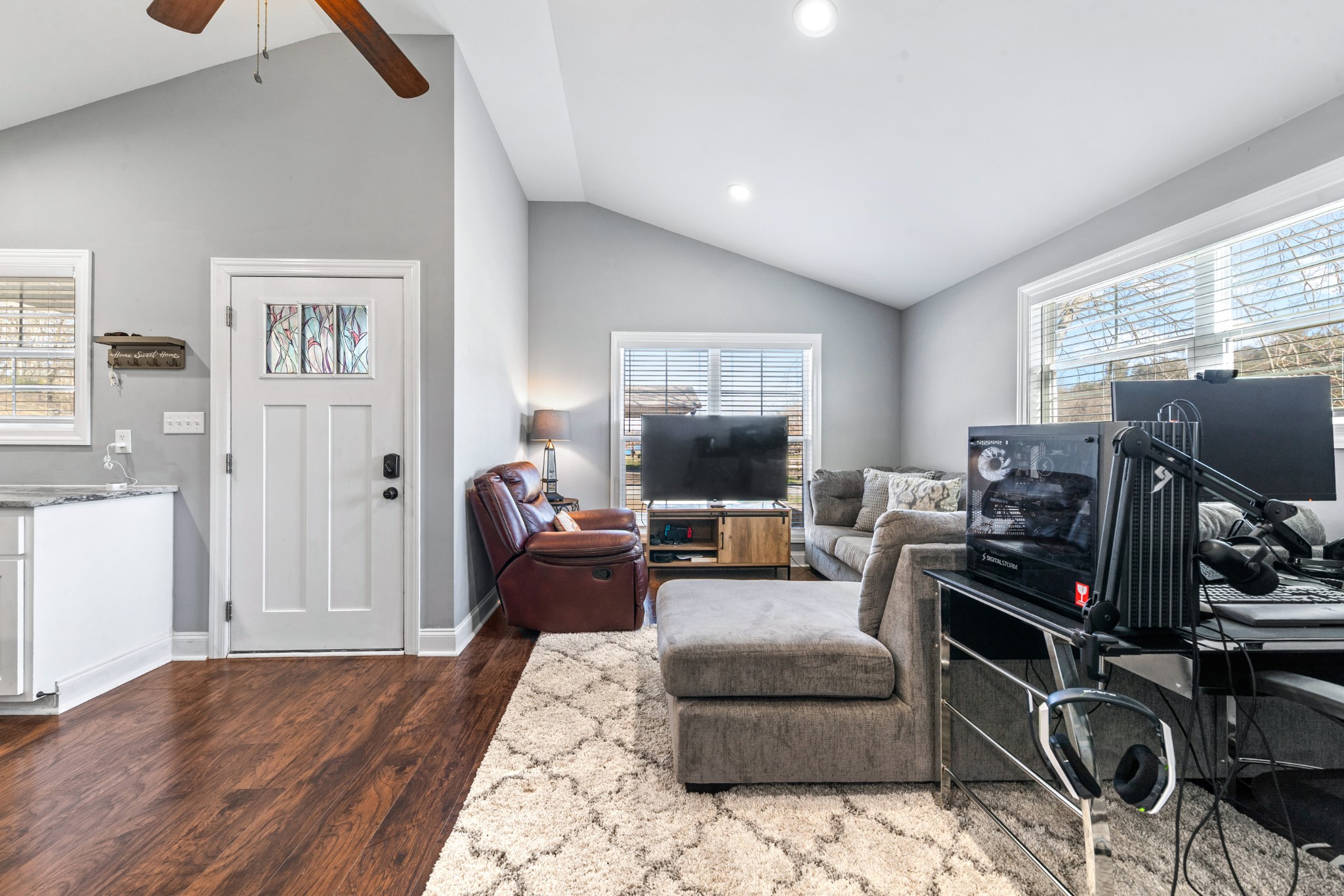 807 Clear Creek Road Pulaski, TN 38478 - Photo 10 of 68 a living room with furniture a flat screen tv and a window