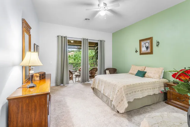 a bathroom with a shower sink and mirror