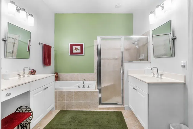 a house view with a seating space and potted plants