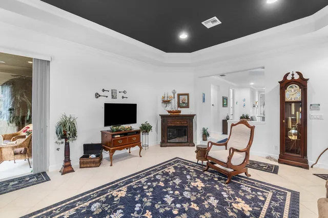 a spacious bathroom with a granite countertop sink a mirror and a