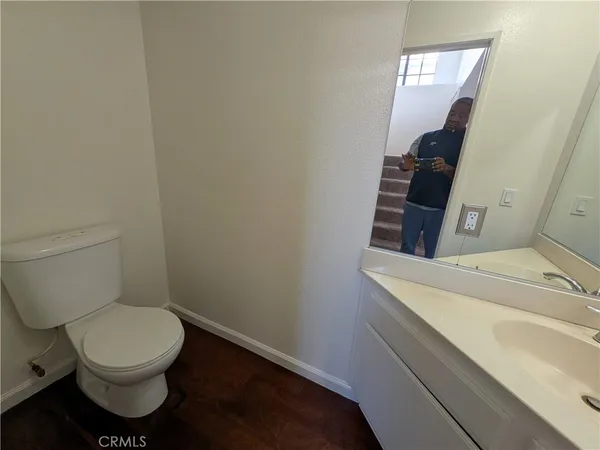 a bathroom with a toilet and a sink