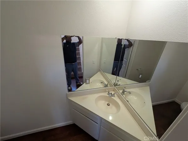 a bathroom with a sink and vanity