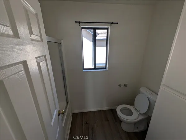 a bathroom with a toilet and a sink