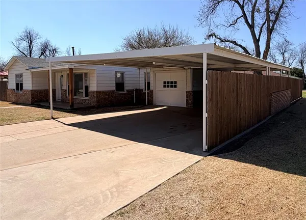 a front view of house with yard