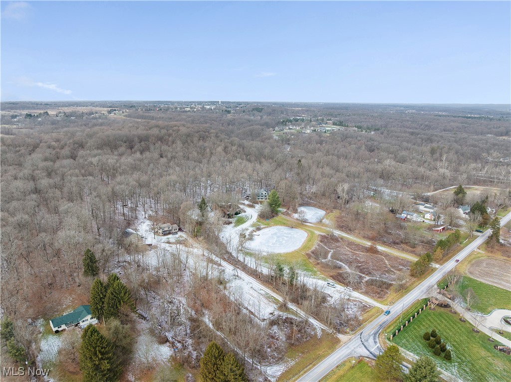 7014 River Styx Road Medina, OH 44256 - Photo 45 of 49 Aerial view of property and surrounding area featuring a heavily wooded area