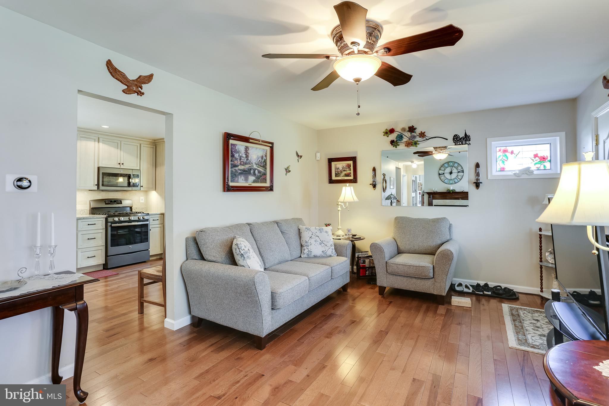 7844 North Cove Road Baltimore, MD 21219 - Photo 6 of 31 Living Room with Ceiling Fan