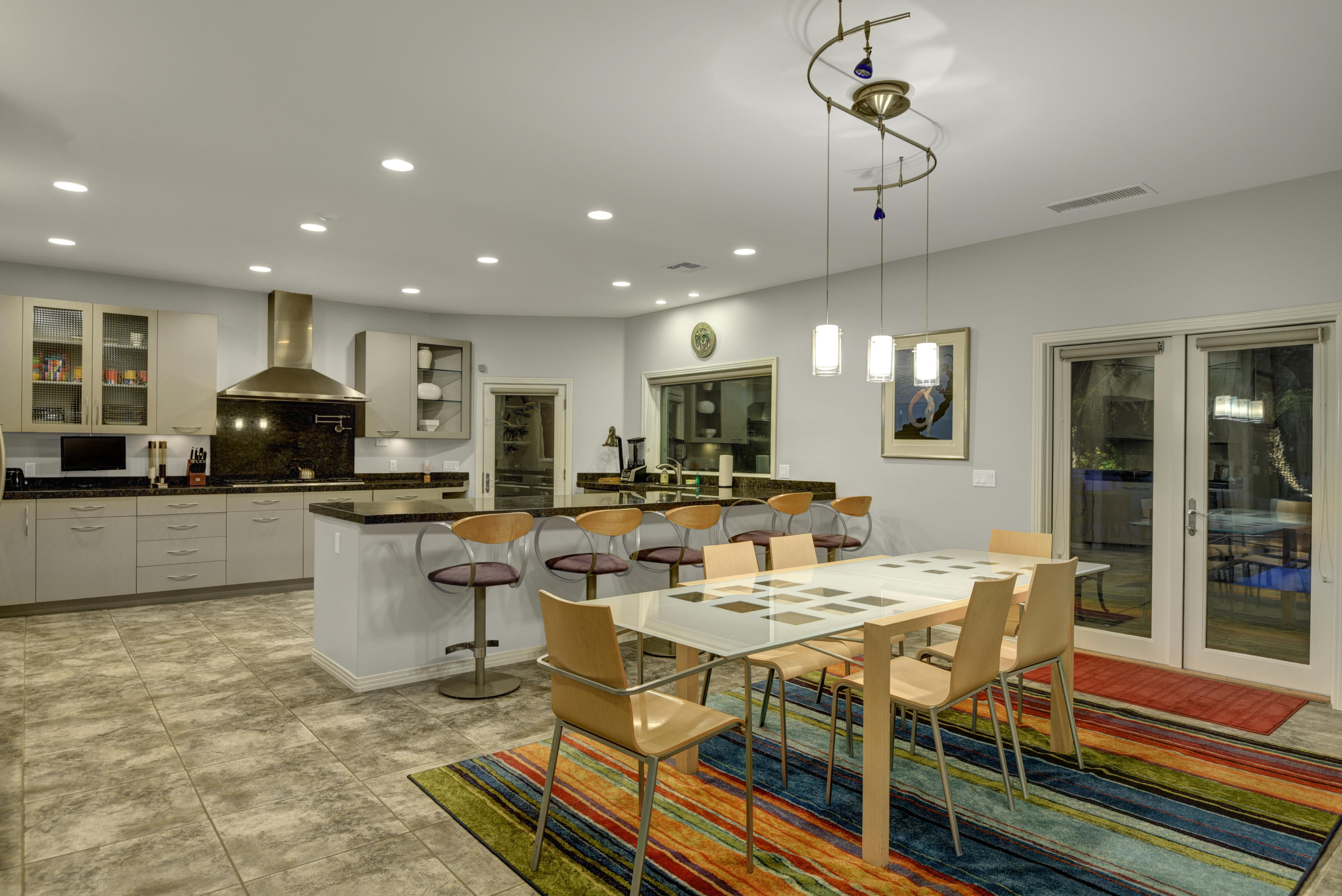 73543 Juniper Street Palm Desert, CA 92260 - Photo 14 of 44 a view of a dining area with furniture