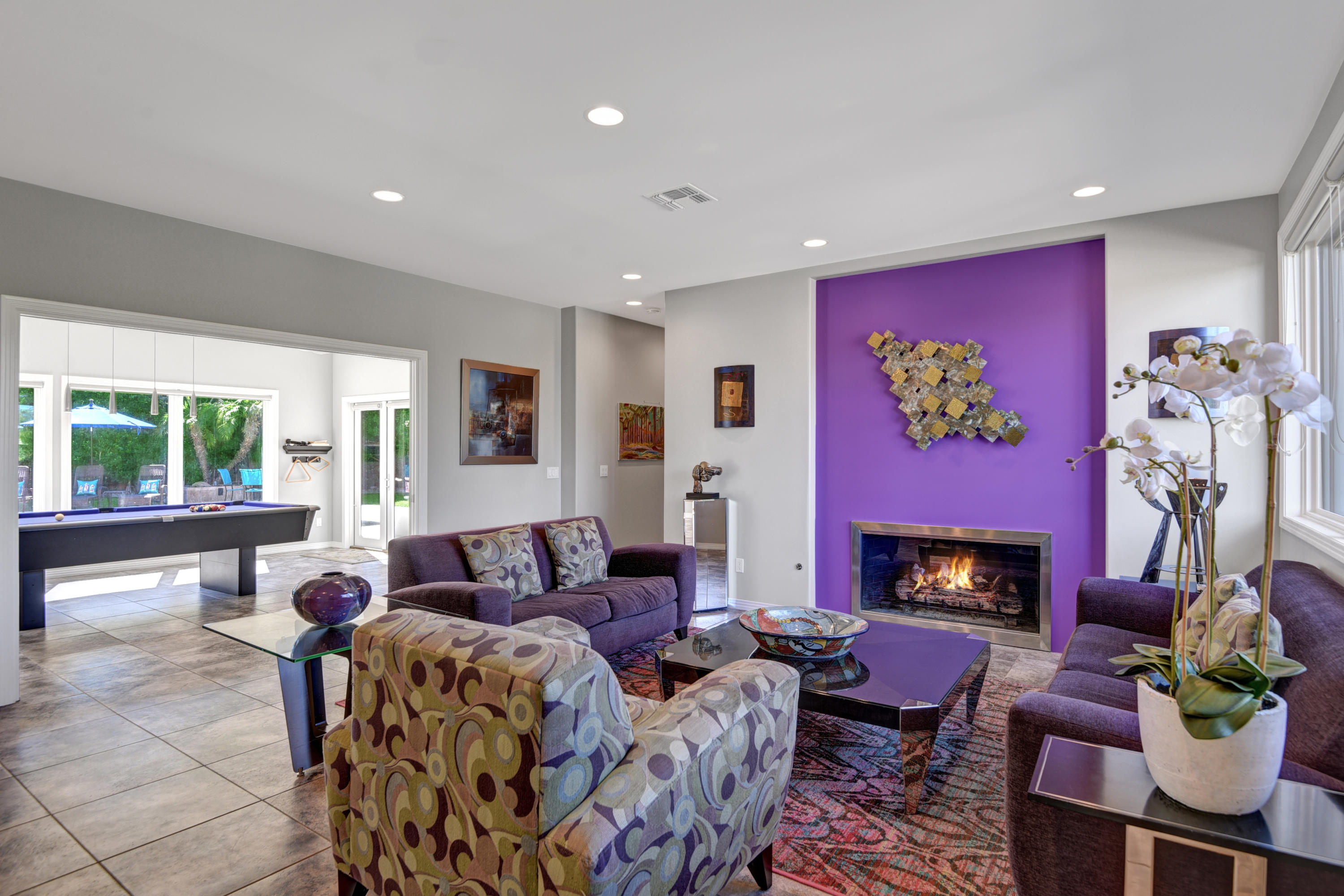 73543 Juniper Street Palm Desert, CA 92260 - Photo 27 of 44 a living room with furniture and a fireplace