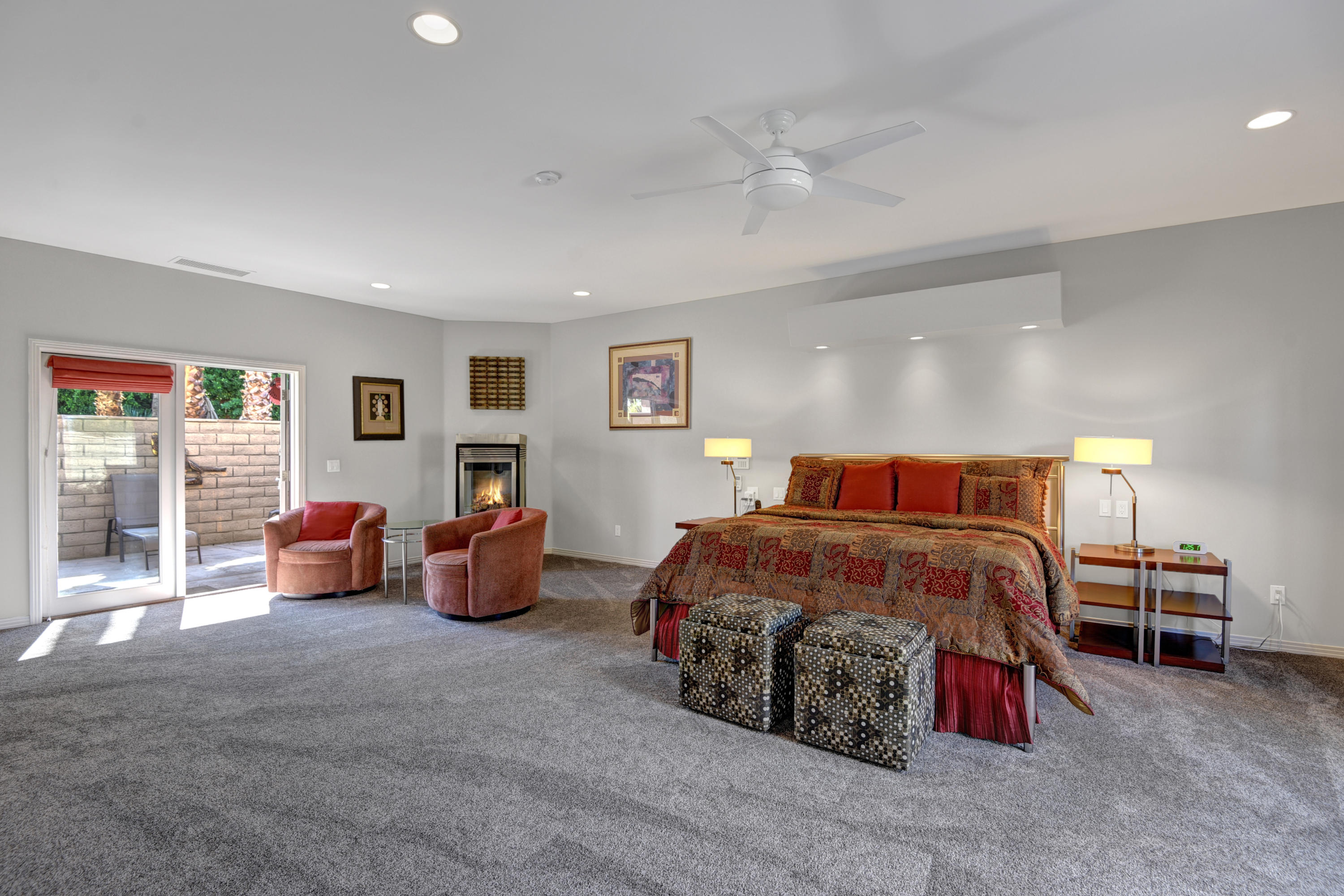 73543 Juniper Street Palm Desert, CA 92260 - Photo 31 of 44 a bedroom with a bed and furniture