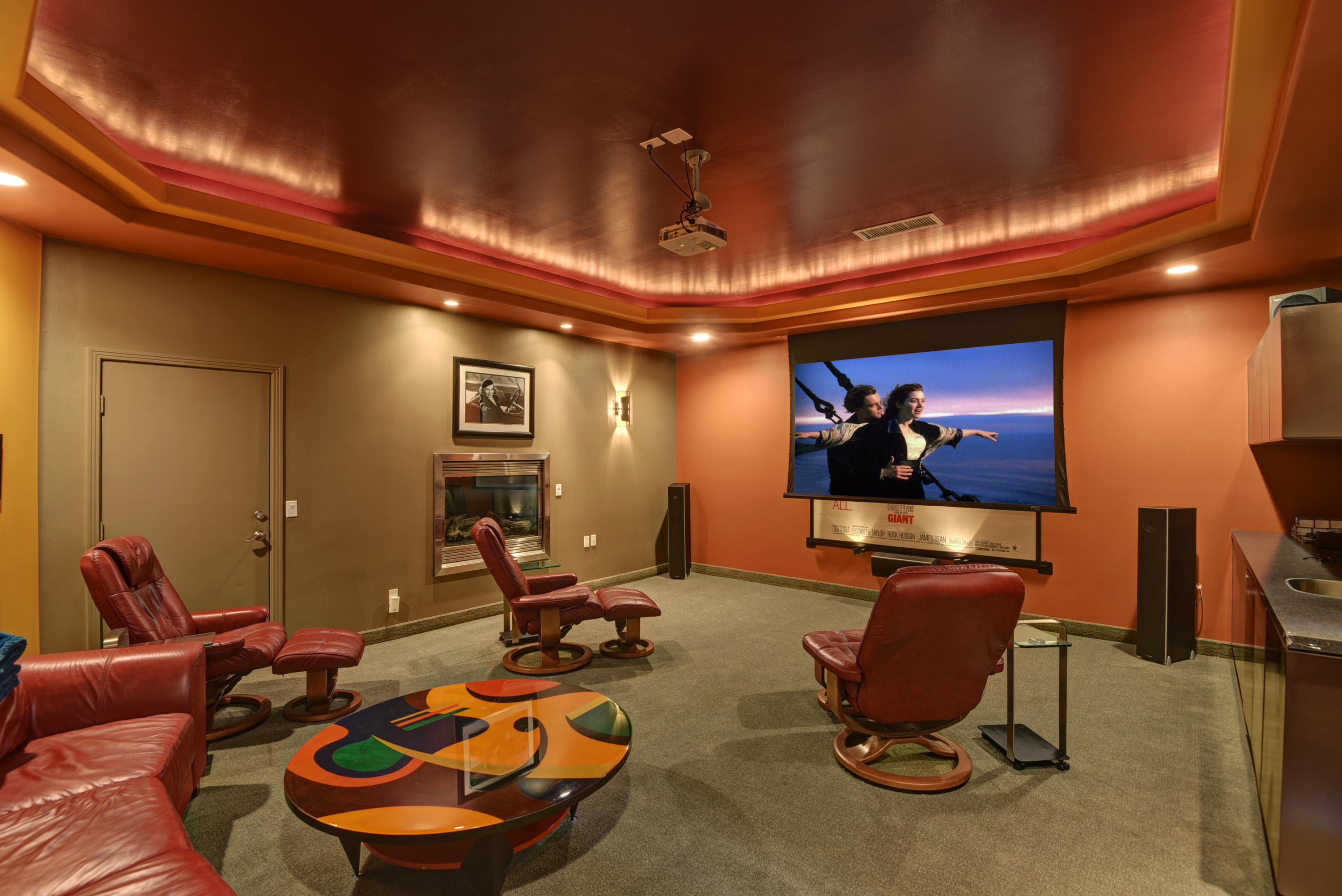 73543 Juniper Street Palm Desert, CA 92260 - Photo 43 of 44 a room with furniture a gym equipment and a chandelier