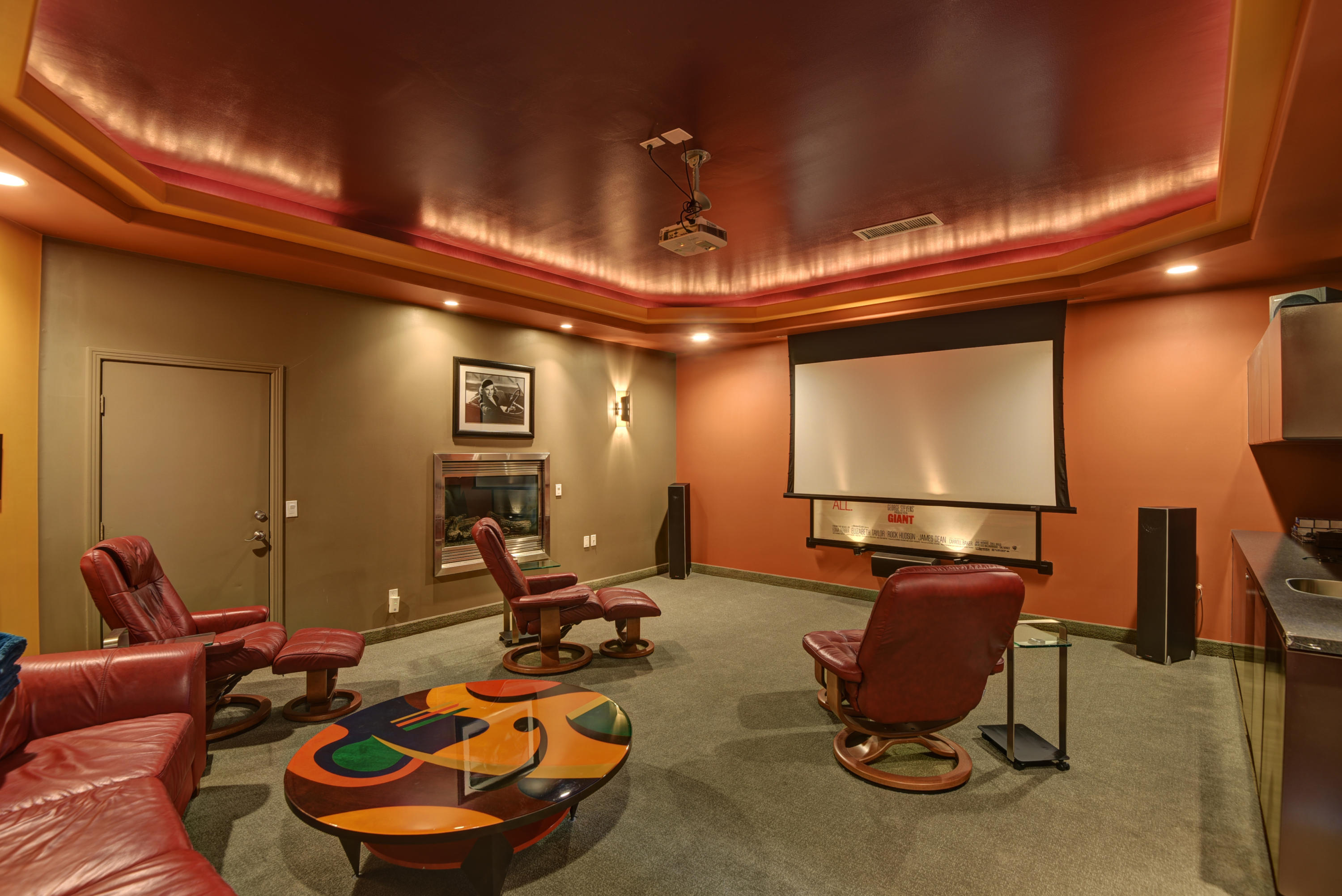 73543 Juniper Street Palm Desert, CA 92260 - Photo 44 of 44 a room with furniture a projector and screen