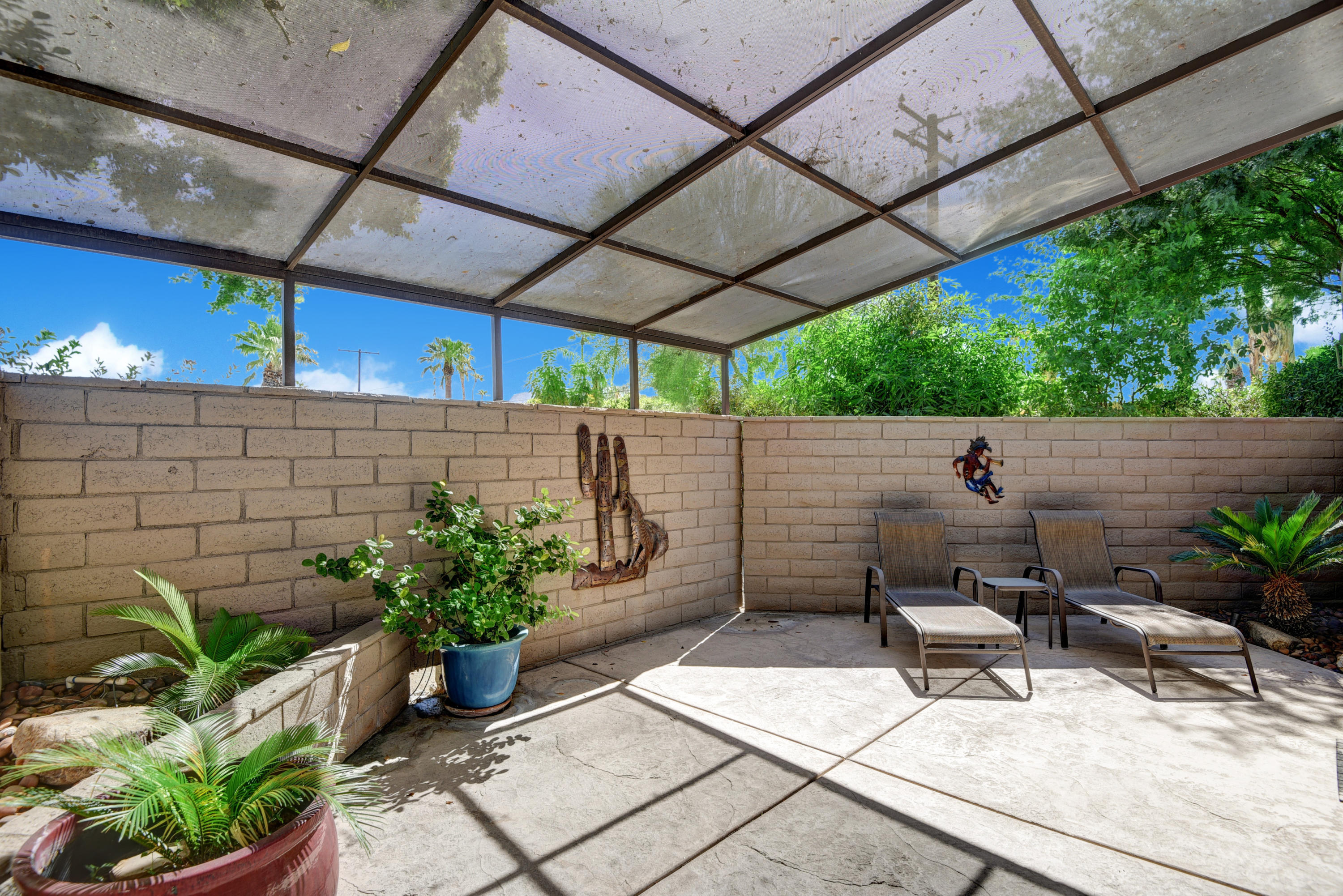 73543 Juniper Street Palm Desert, CA 92260 - Photo 6 of 44 a view of outdoor space with sitting area