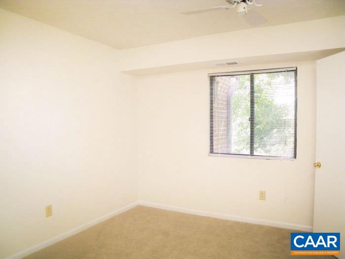 117 Turtle Creek Road, Unit 8 Charlottesville, VA 22901 - Photo 1 of 4 a view of an empty room with a window