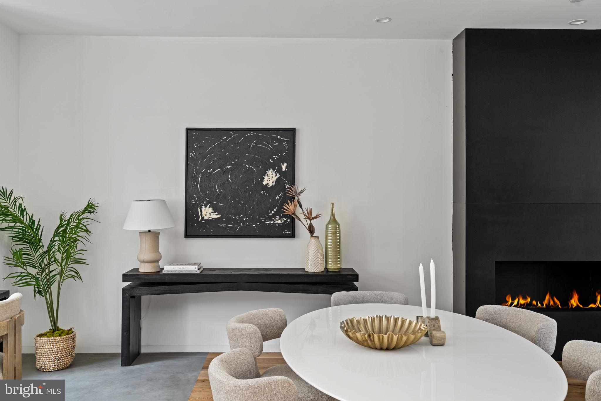 1428 Kenilworth Street Philadelphia, PA 19146 - Photo 16 of 58 a room with furniture and a potted plant