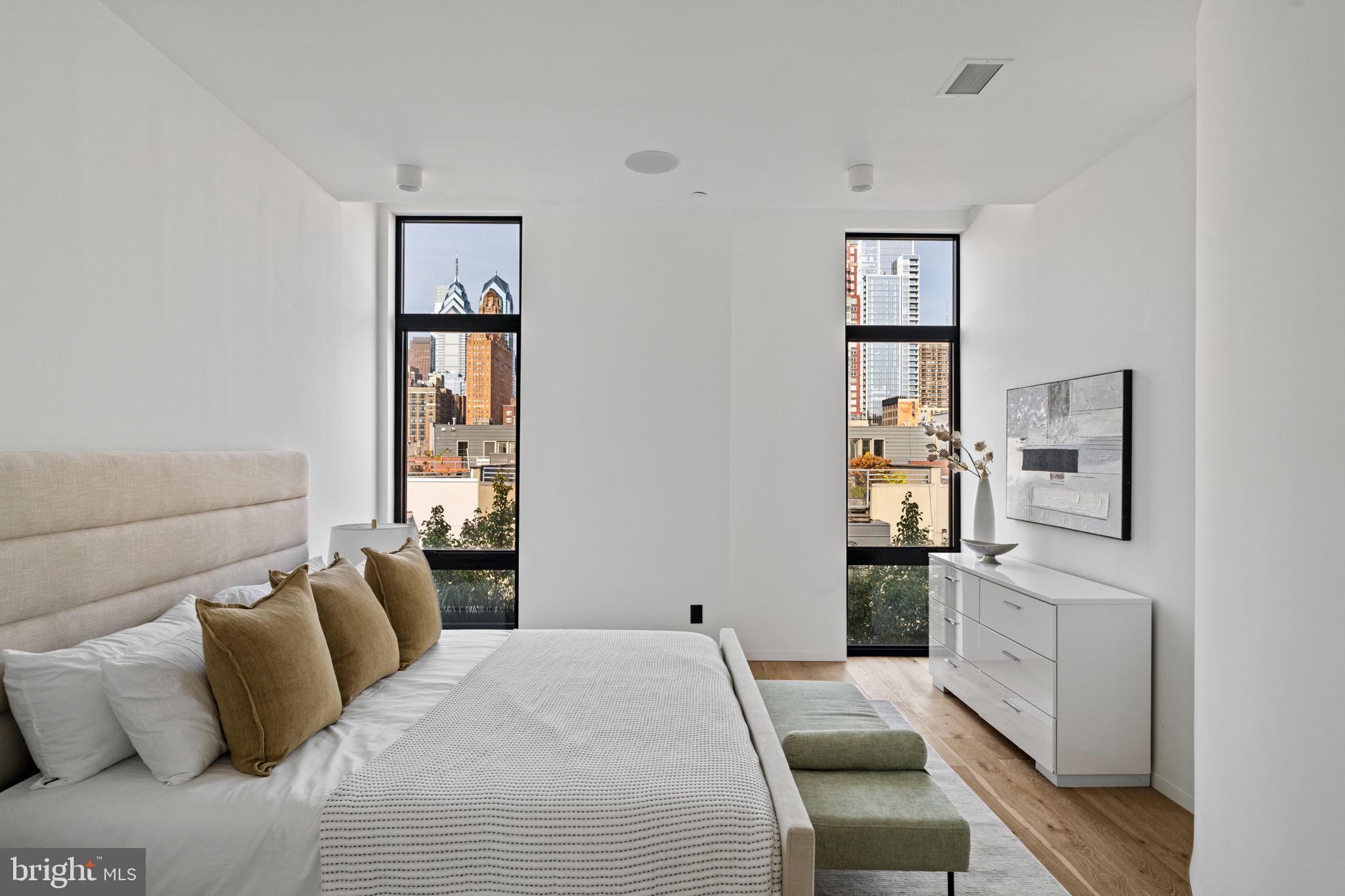 1428 Kenilworth Street Philadelphia, PA 19146 - Photo 28 of 58 a bedroom with a bed and a window