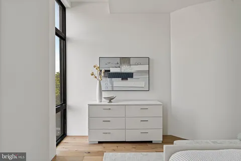 a bathroom with a double vanity sink and mirror