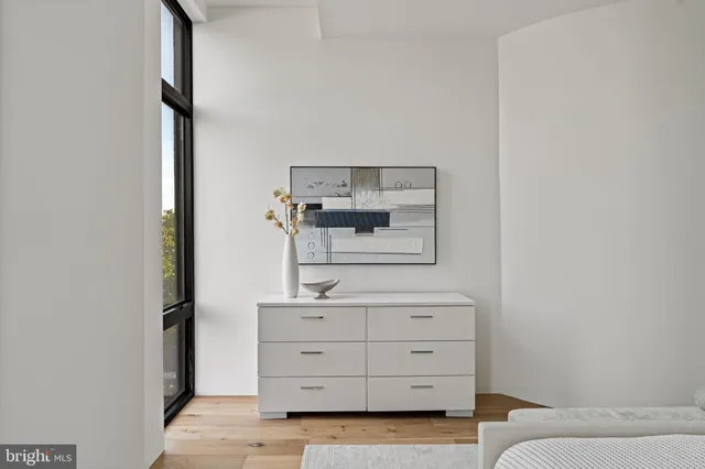 a bathroom with a double vanity sink and mirror