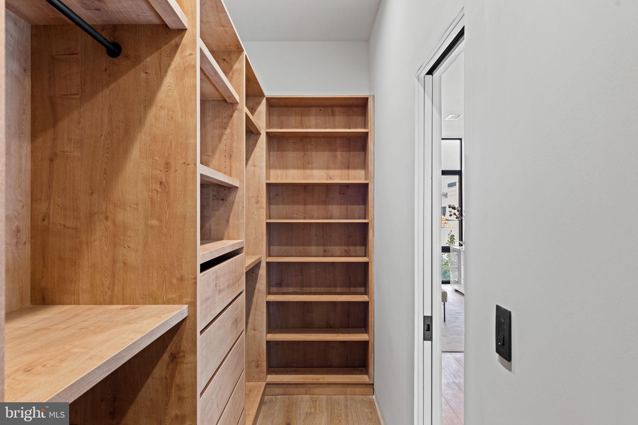 1428 Kenilworth Street Philadelphia, PA 19146 - Photo 34 of 58 a view of walk in closet with empty racks