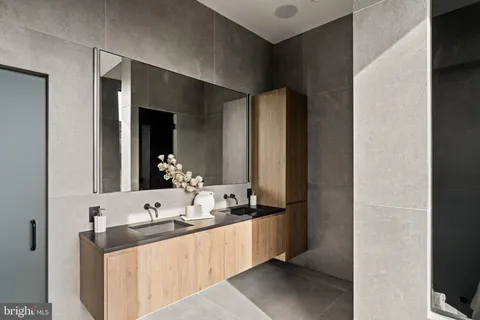 a bathroom with a sink and toilet