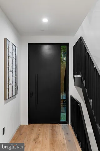 a view of a hallway with staircase