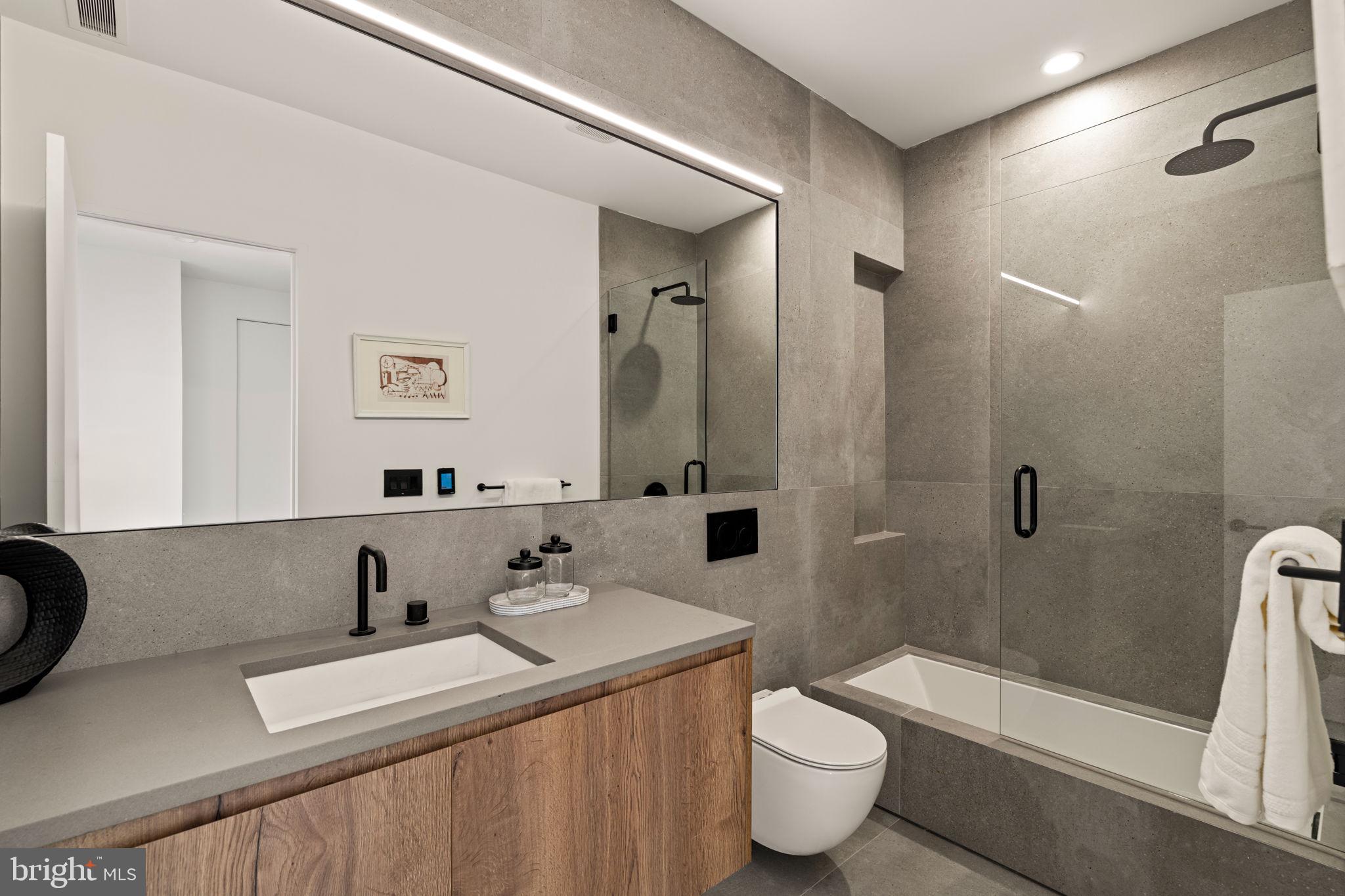 1428 Kenilworth Street Philadelphia, PA 19146 - Photo 42 of 58 a bathroom with a sink and toilet