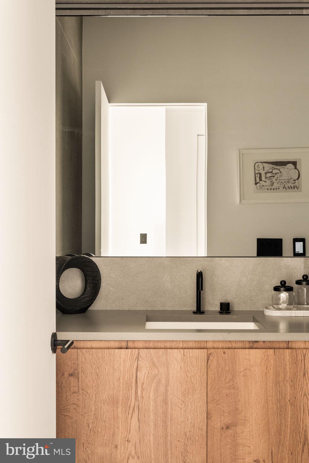 1428 Kenilworth Street Philadelphia, PA 19146 - Photo 43 of 58 a view of cabinets and window