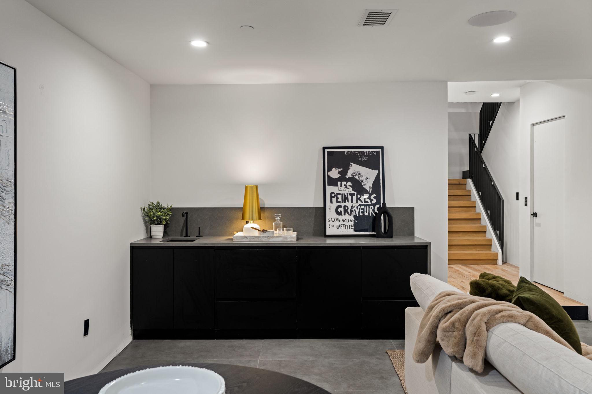 1428 Kenilworth Street Philadelphia, PA 19146 - Photo 50 of 58 a living room with furniture and wooden floor