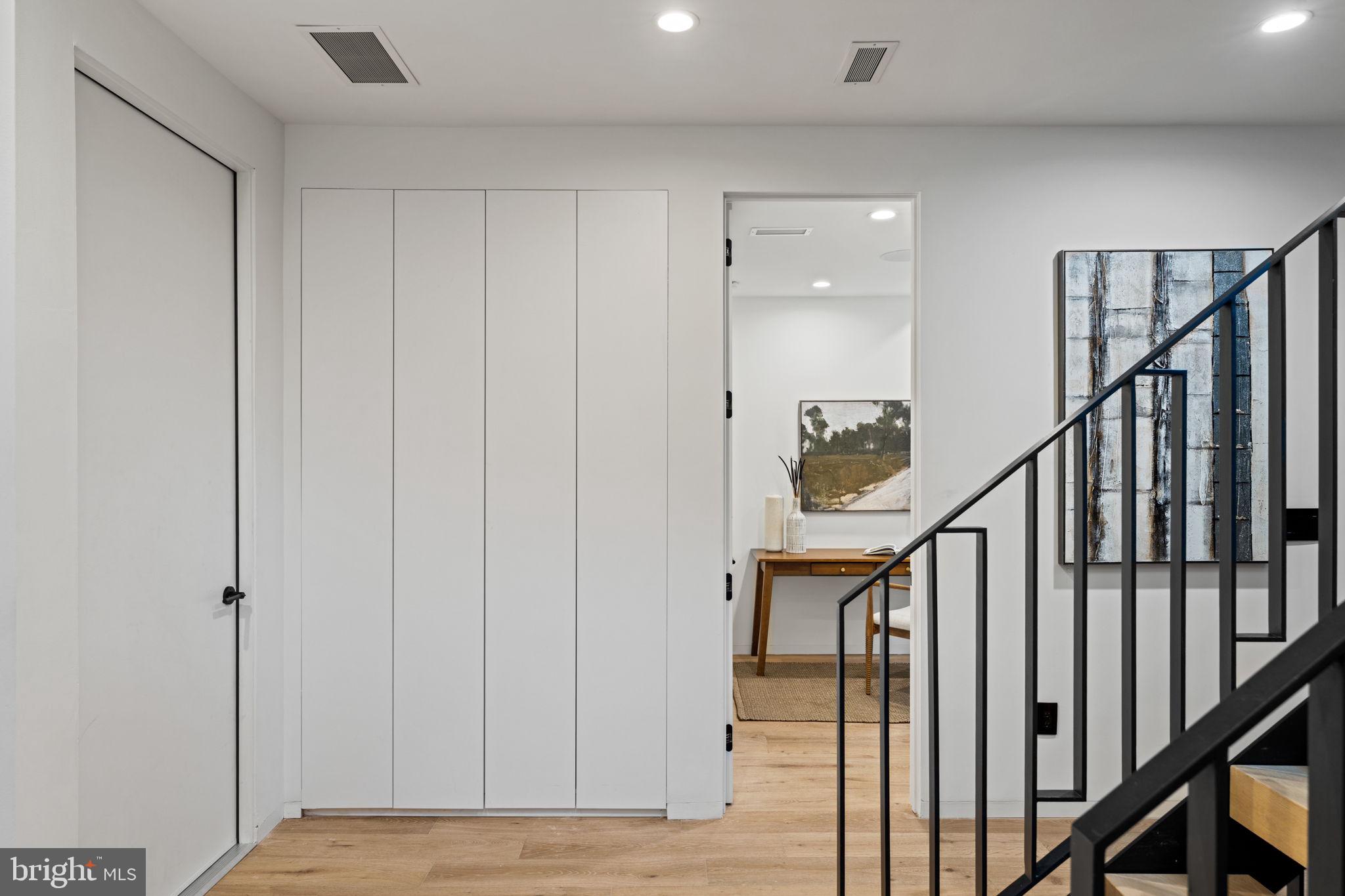 1428 Kenilworth Street Philadelphia, PA 19146 - Photo 6 of 58 a view of staircase with wooden floor and stairs