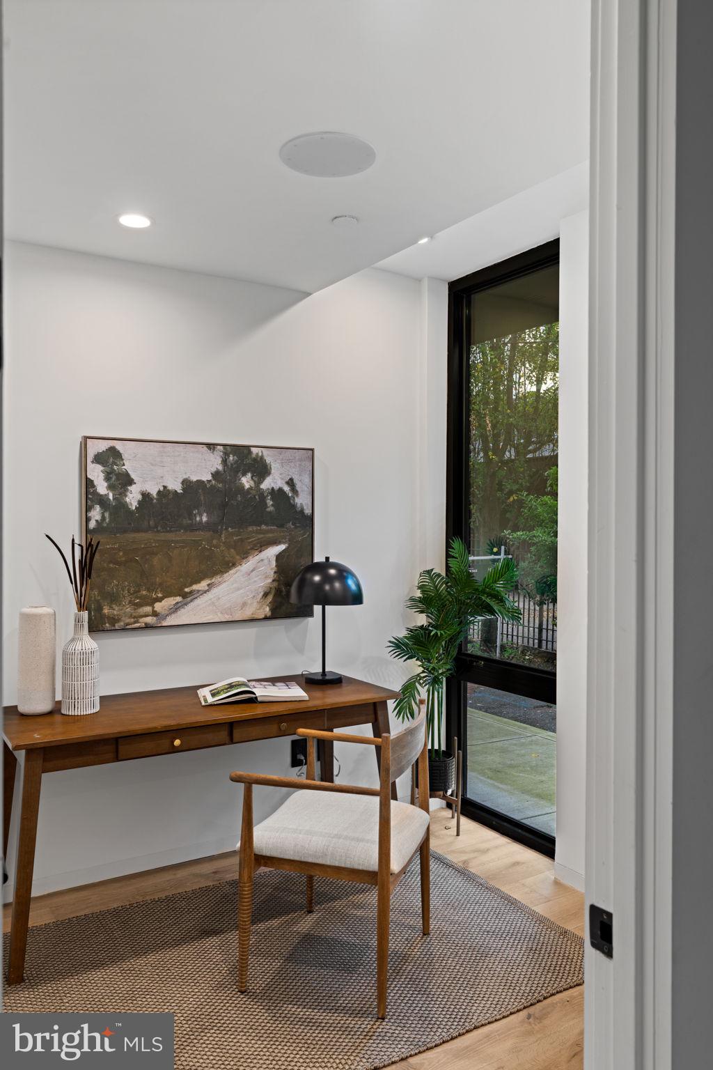 1428 Kenilworth Street Philadelphia, PA 19146 - Photo 7 of 58 a living room with furniture and a potted plant